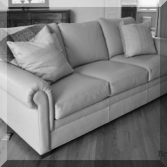 F41. Ethan Allen buff colored leather sofa. Some scuffing. 32”h x 82”w x 39”d - $750